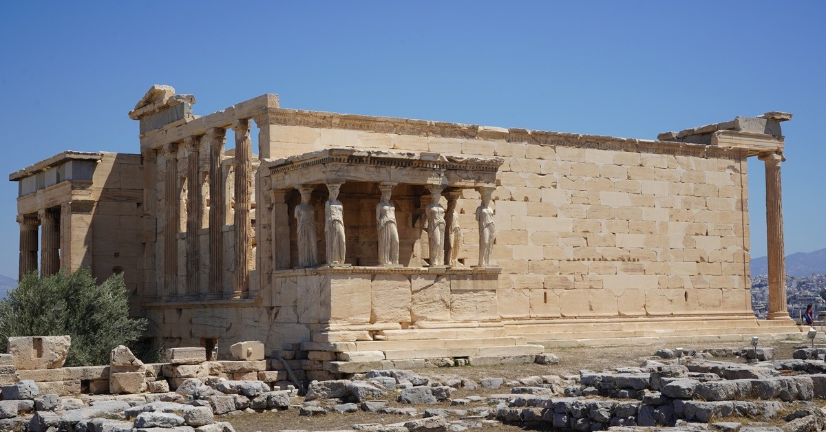 Ancient architecture that has started to fall apart. It's still standing, but much of it appears to be missing.